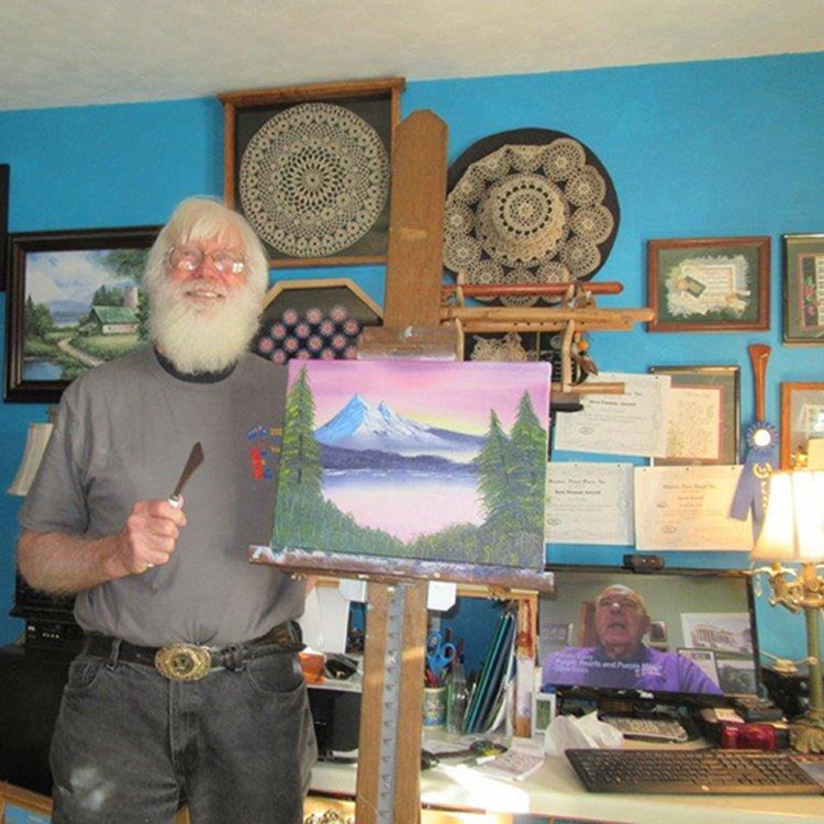 veteran James Nickel participates in the Bob Ross Workshop.