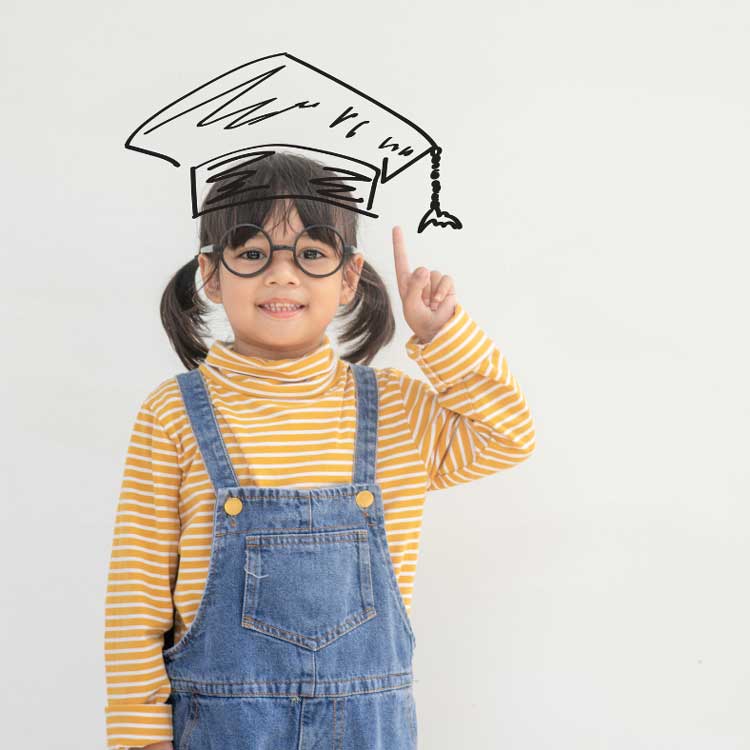child with hand-drawn graduation cap 