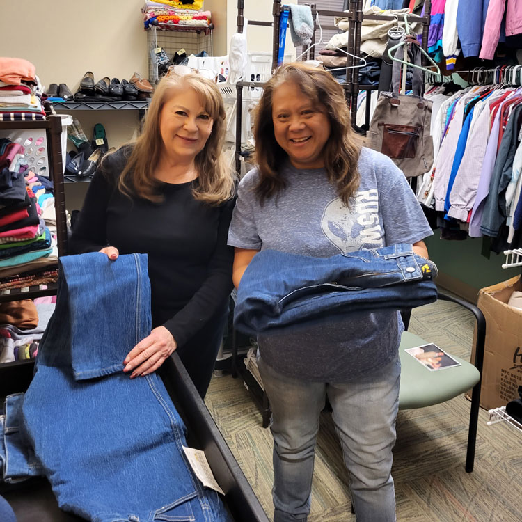 Darlene, on left, helping at the VA