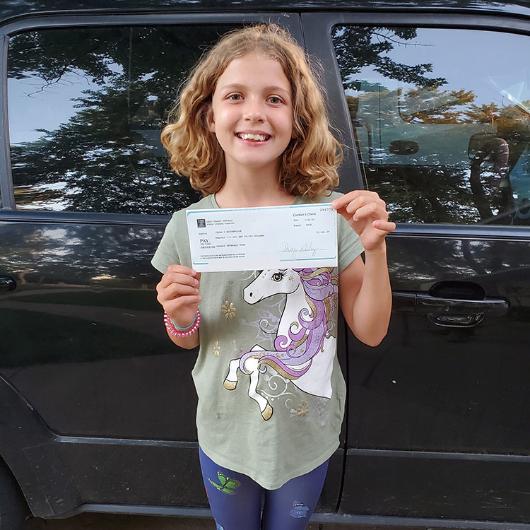 Junior member’s lemonade stand raises $1,000 for veterans