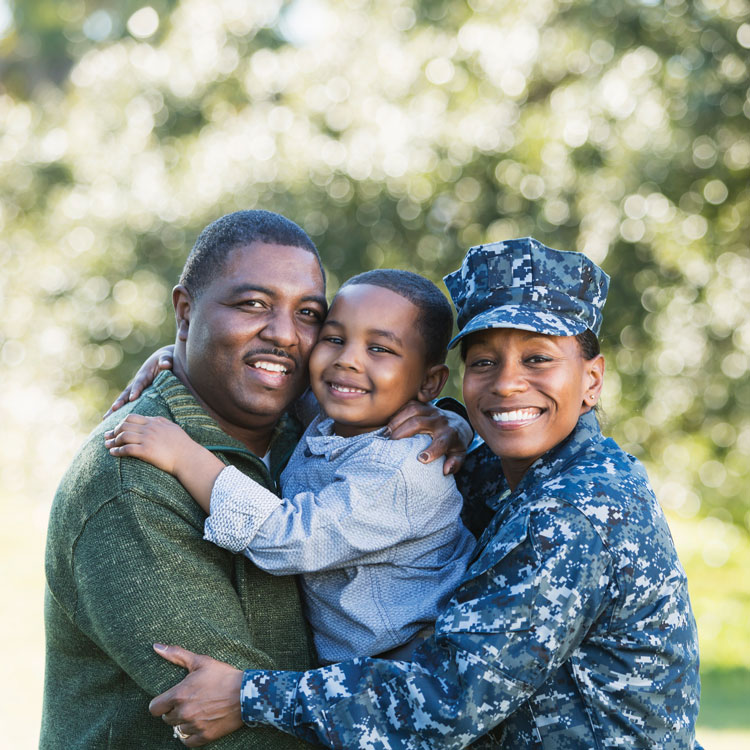 women veteran with her family