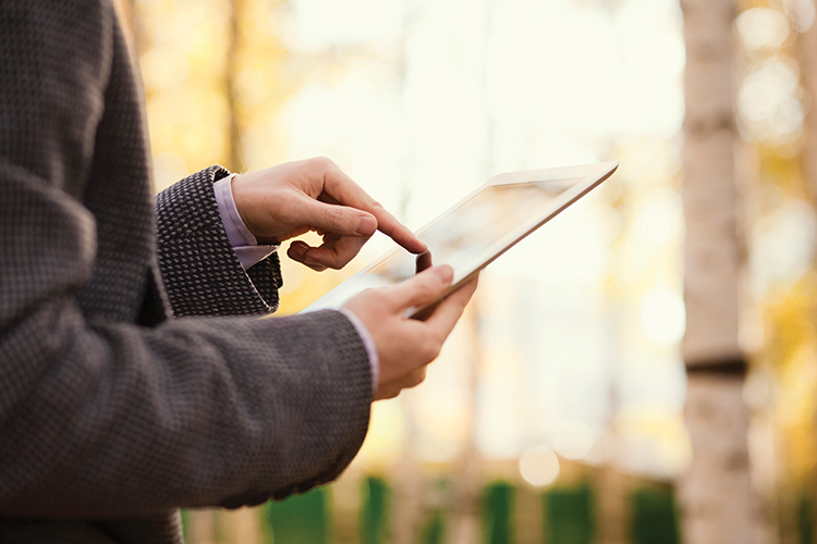 person with tablet